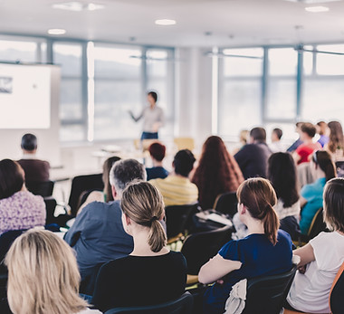 Business and entrepreneurship symposium. Speaker giving a talk at business meeting. Audien
