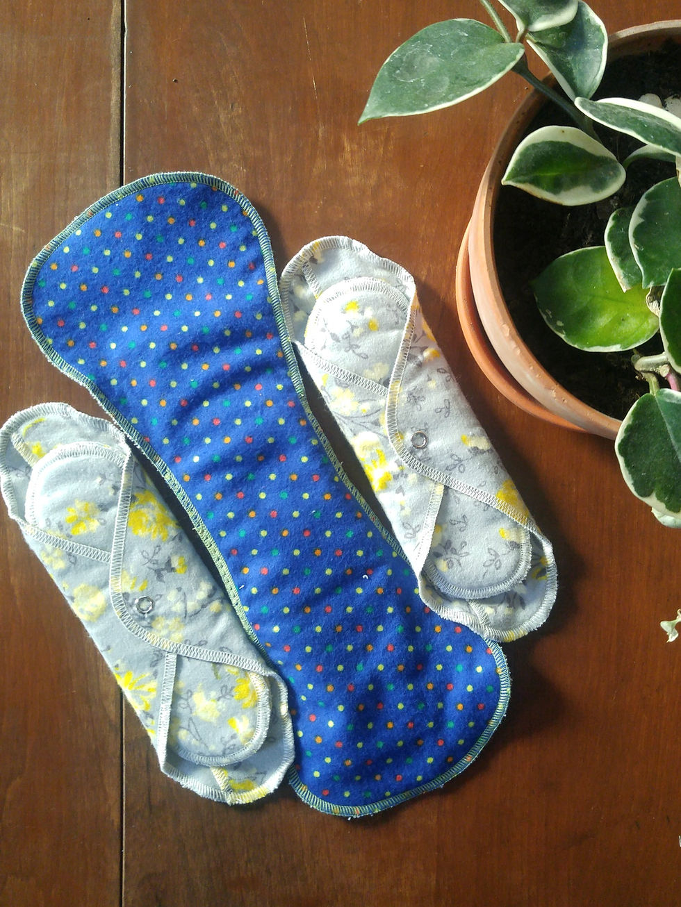 GladRags plastic free cloth period pads on a table