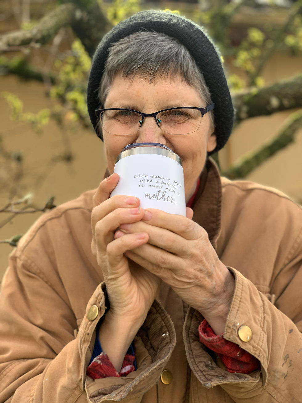 Mom holding a mother's day reusable cup