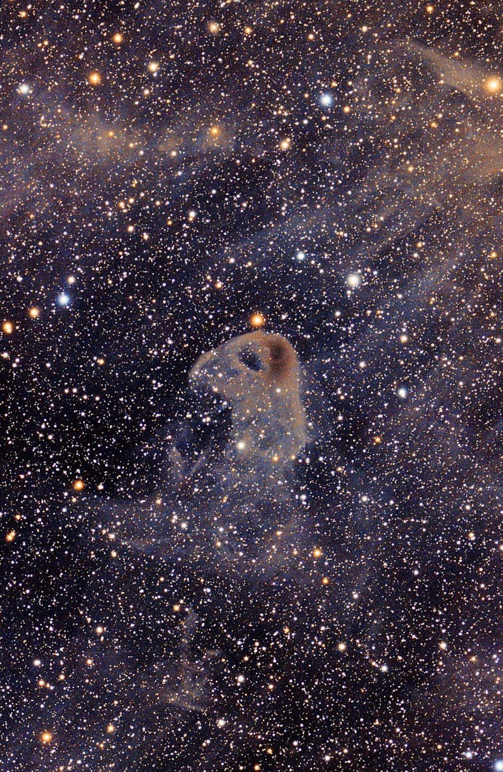A large cloud of interstellar dust known as LBN777 in the Taurus Constellation