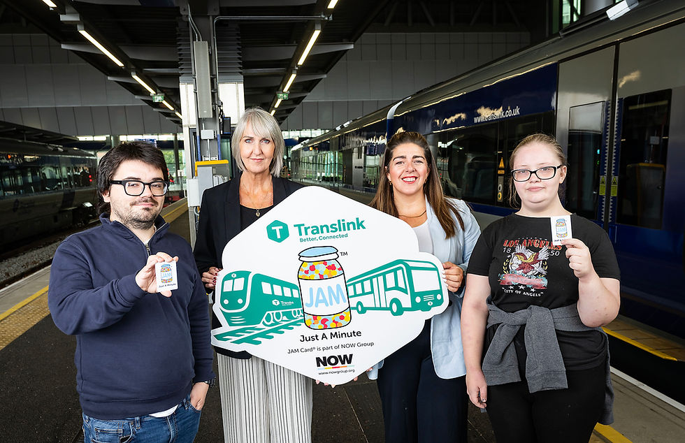 Jacqui Kennedy, Maeve Monaghan, and Louise McBride showcase the JAM Card initiative at a Translink station, highlighting its role in promoting accessibility and understanding for those who need a little extra time.