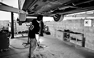 car-repair-maintenance-theme-mechanic-uniform-working-auto-service_edited.jpg