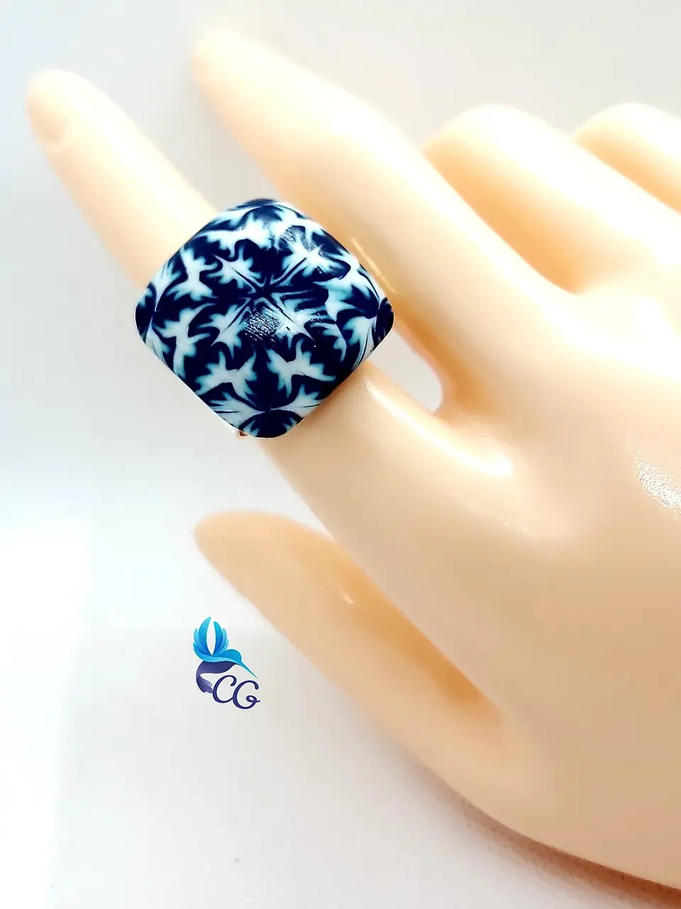 Adjustable ring with polymer clay cabochon