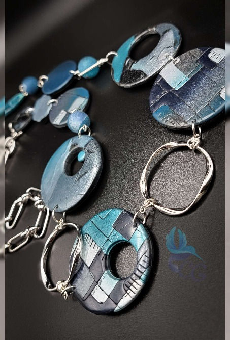 Thumbnail: Necklace "Metallic blue station" - This beautiful blue metallic color station necklace is made of polymer clay. The component