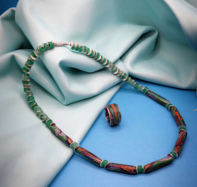 Thumbnail: Jewelry set with ethnic Peruvian pattern. Choker necklace and matching earrings. Made from polymer clay beads. Stainless stee