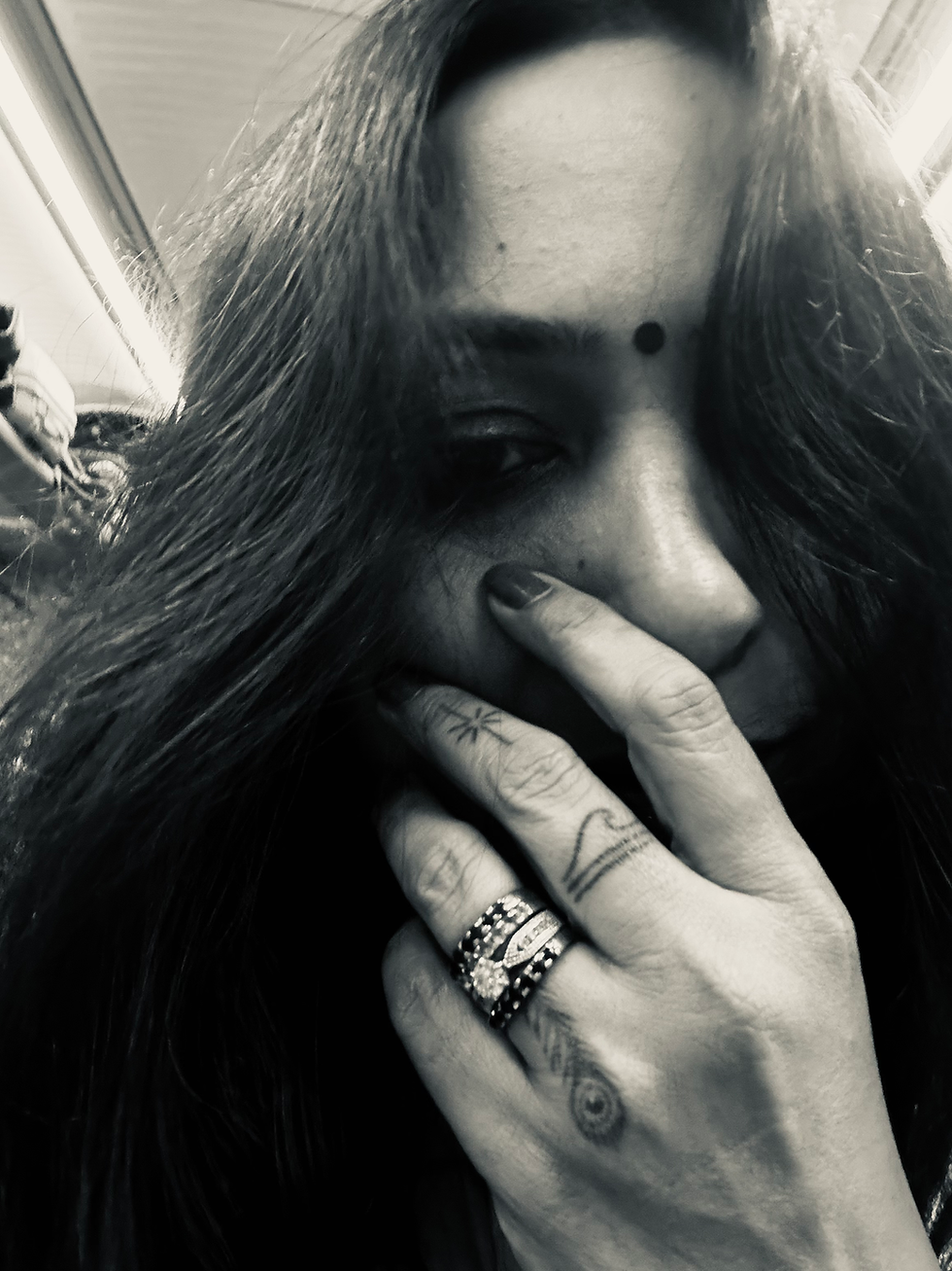 parita in pensive thought black and white