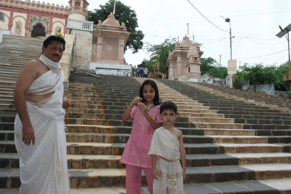grand kids with grand father at temple, derasar, palitana
