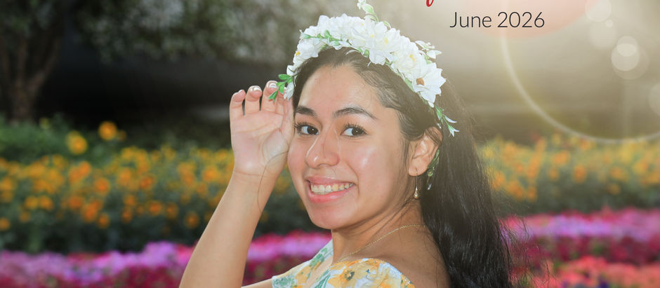 woman with a crown of flowers and smiling