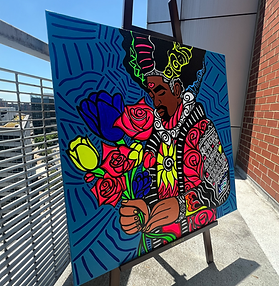Black man with colorful flowers painted on canvas