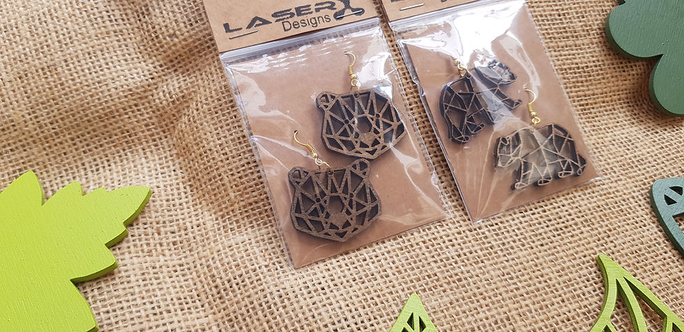 Thumbnail: bear wooden earings with gold or silver metalwork