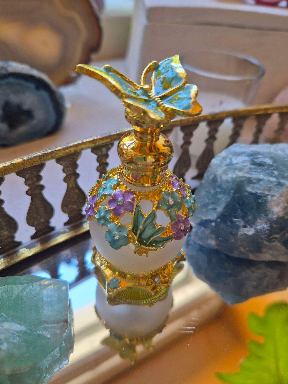 Thumbnail: blue and purple mini butterfly perfume bottle