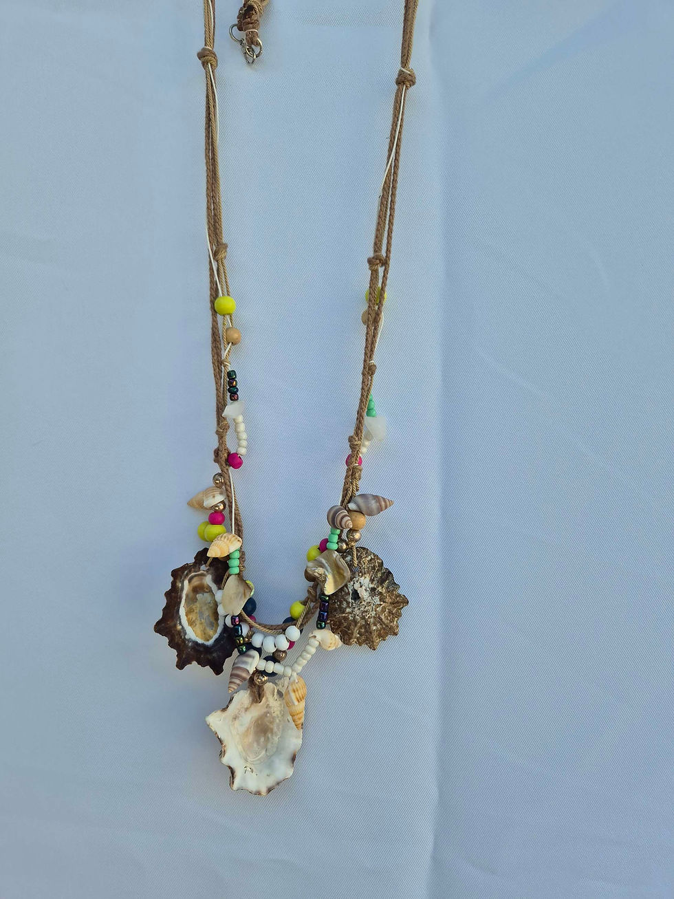 Thumbnail: boho layered colourful shell necklace