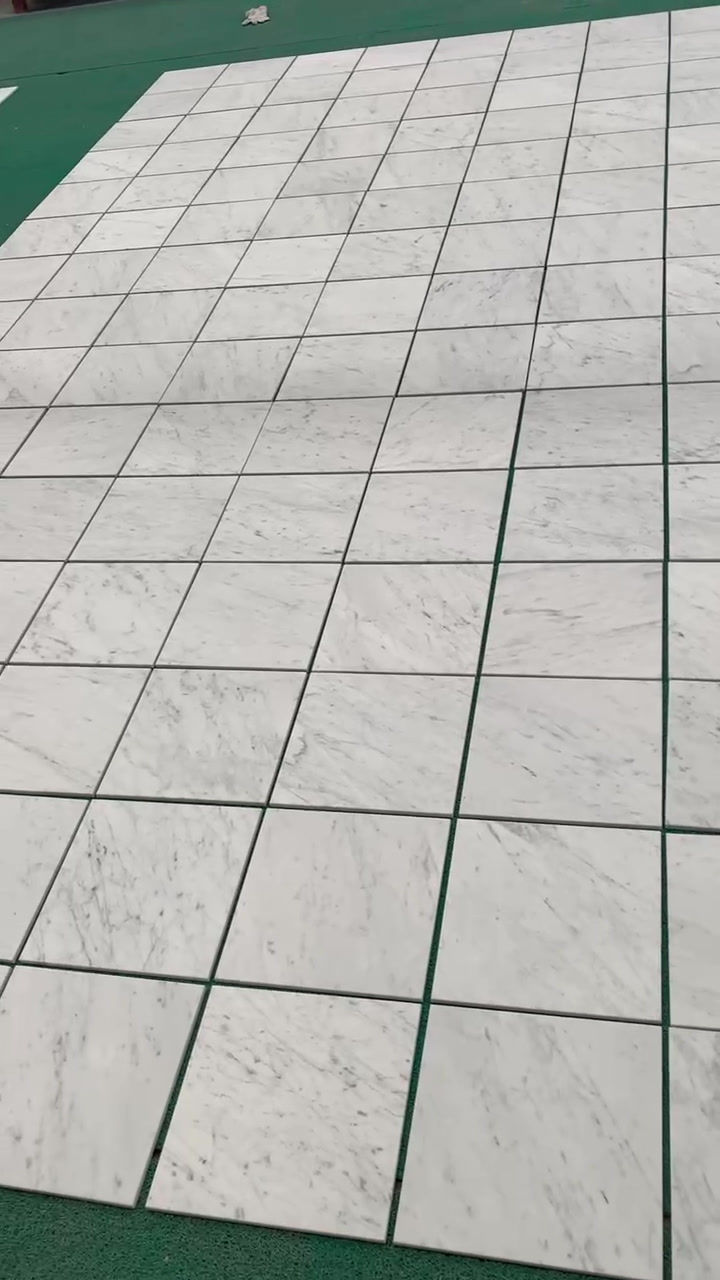 Thumbnail: Honed Carrara White Marble Tiles