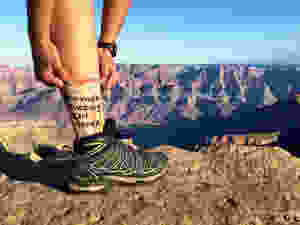 mother fucking girl power socks on a female traveler in the American desert