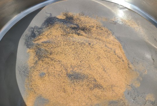 Figure 3: Flake Graphite (0.47%) observed in mottled zone during desliming (source: DY6) | Samso News