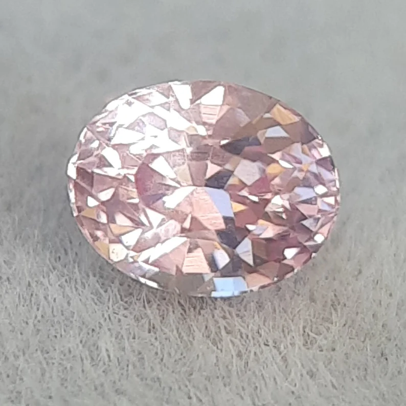 0.60 Carat, Light pink sapphire, Unheated, Oval