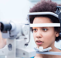 Optometrist conducting eye test for child at Penshurst Eyecare