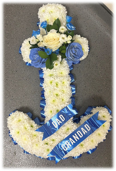 embedded floral anchor funeral tribute