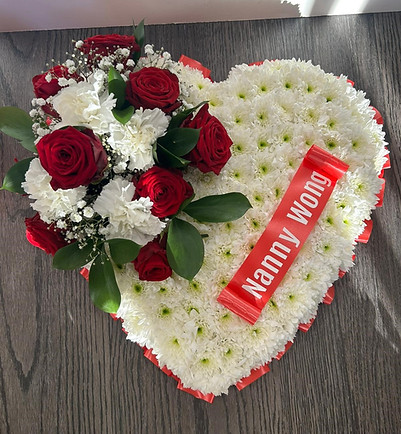 embedded heart floral funeral tribute