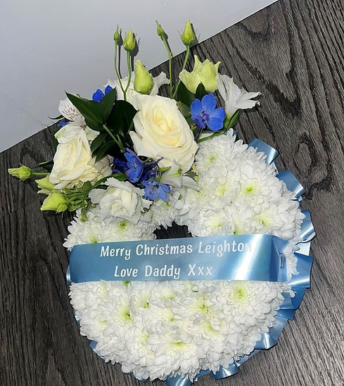 wreath floral tribute for baby funeral