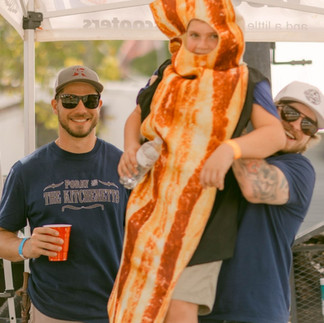 Child in bacon costume
