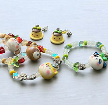 Handmade cute jewelry with dessert charms, teddy bears, and colorful beaded bracelets by Jadey Jane Studio