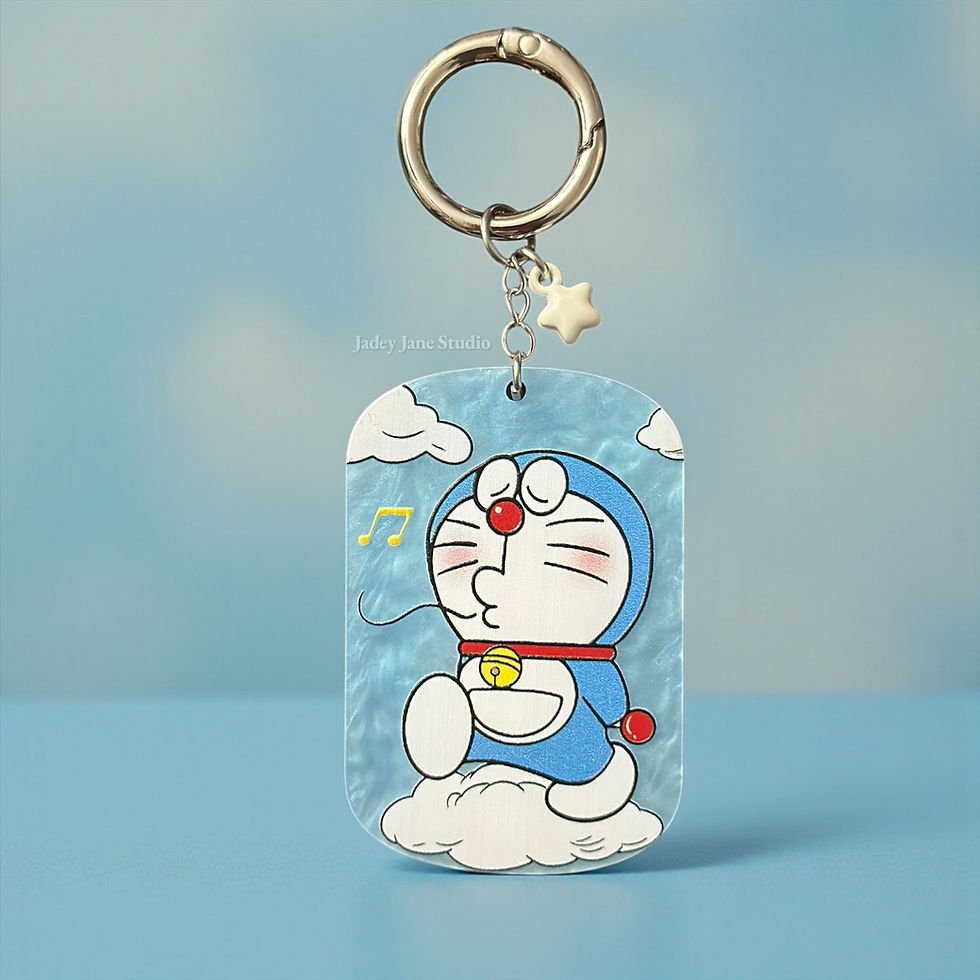 Thumbnail: Doraemon Keychain With Star Charm 