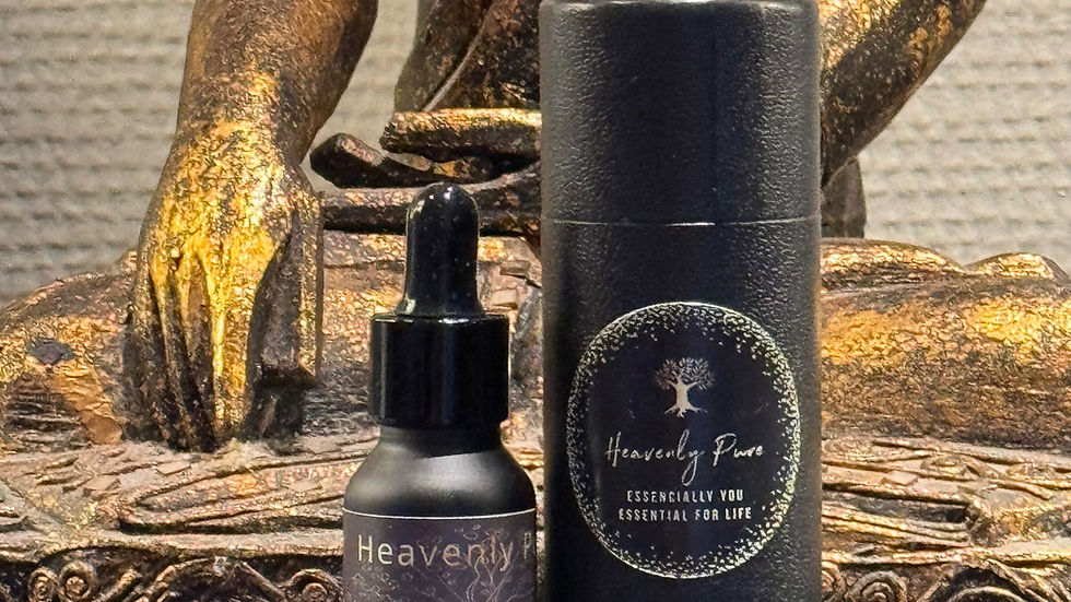 Close-up view of amber essential oil bottle with fresh lavender
