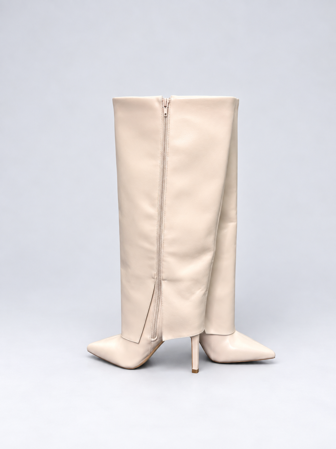 INC ivory pointed-toe boots heel and side detail