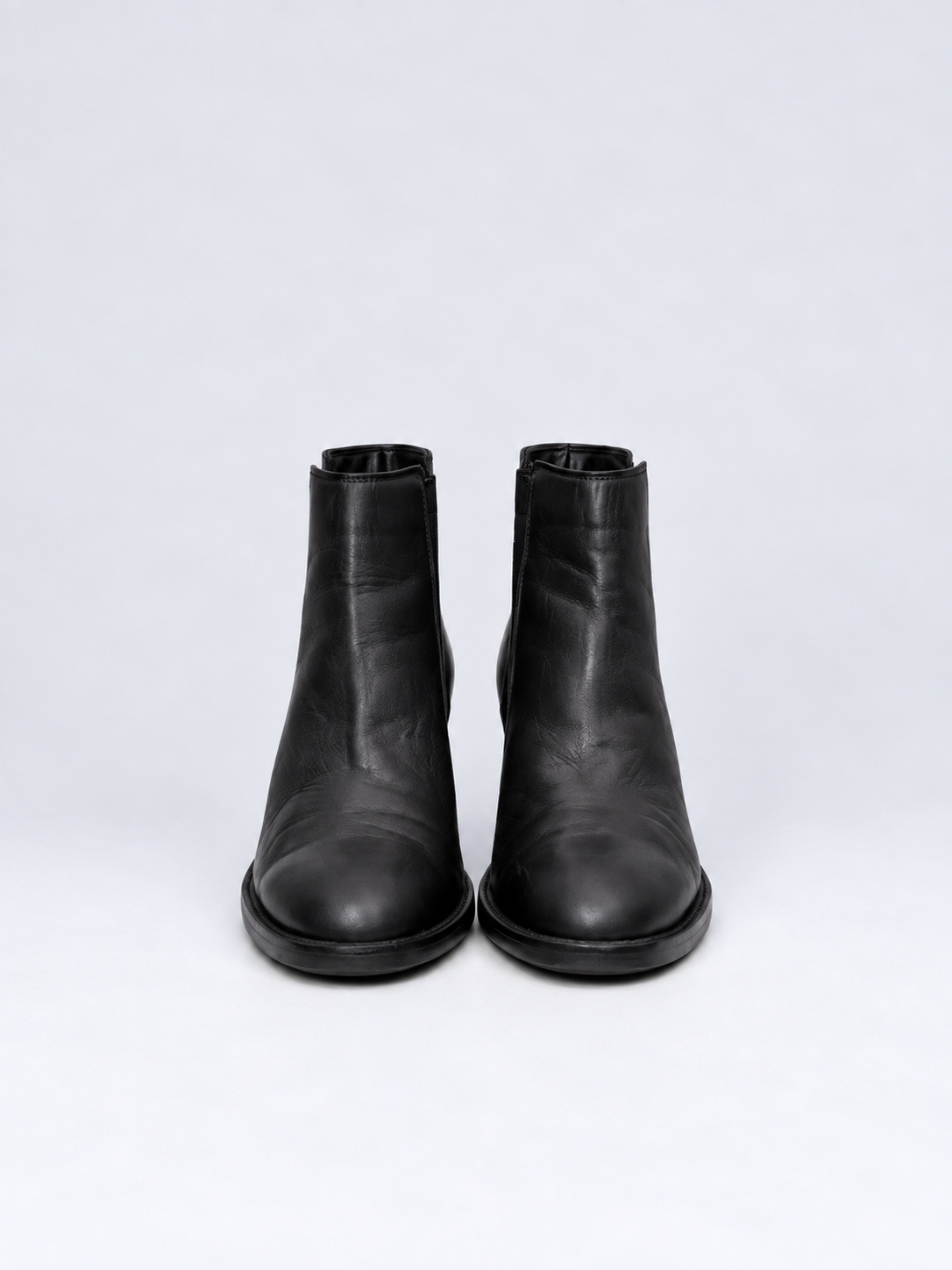 Clarks black leather Chelsea boots front view