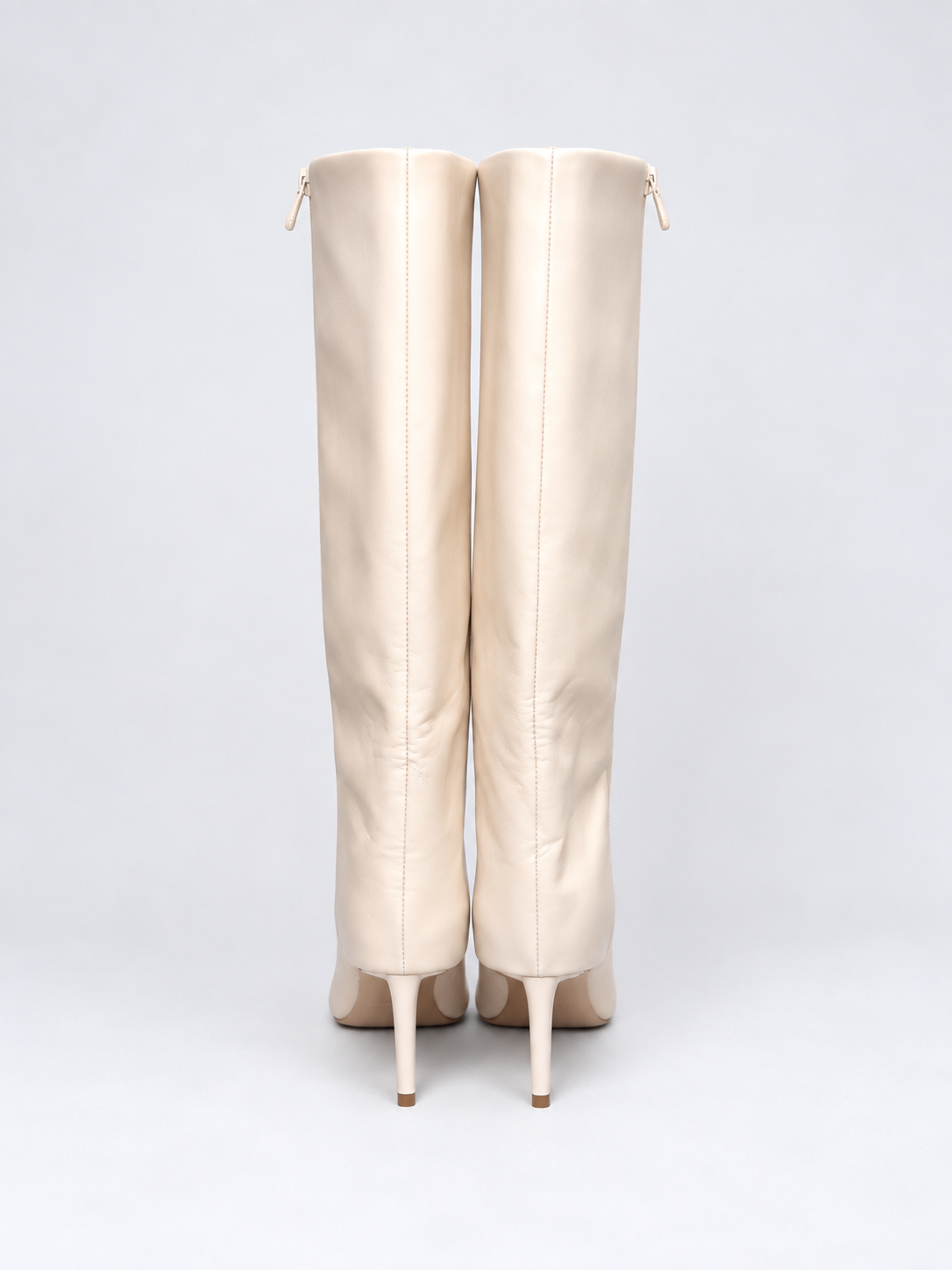 INC ivory pointed-toe boots back detail