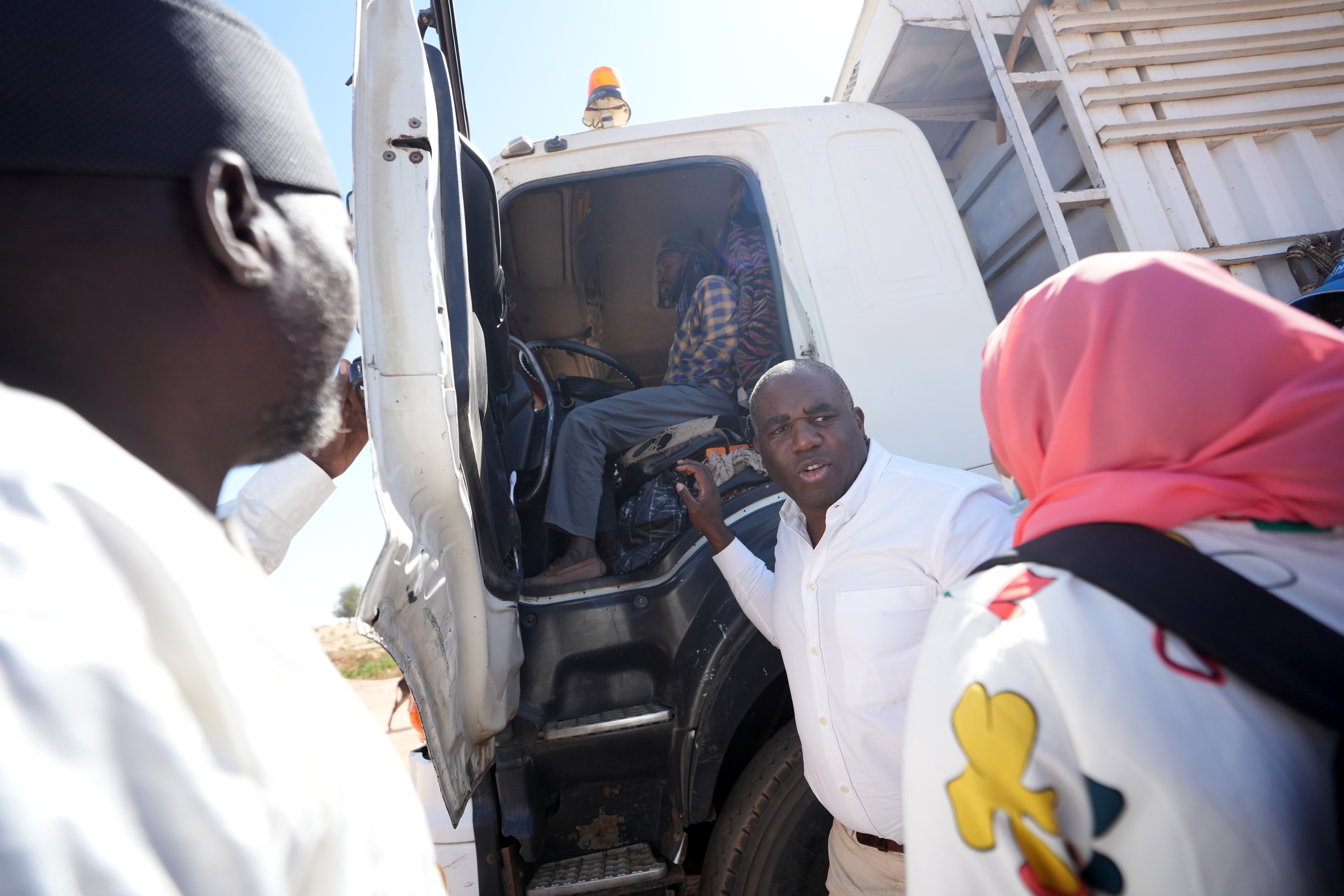 Humanitarian aid trucks travel near the Adré border crossing between Chad and Sudan in January 2025.