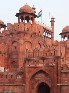 The Indian national flag flies above the Red Fort in Delhi.