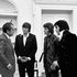 Elvis Presley and companions meet President Richard Nixon in 1970.
