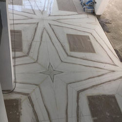 Marble book match flooring made by Marmi
