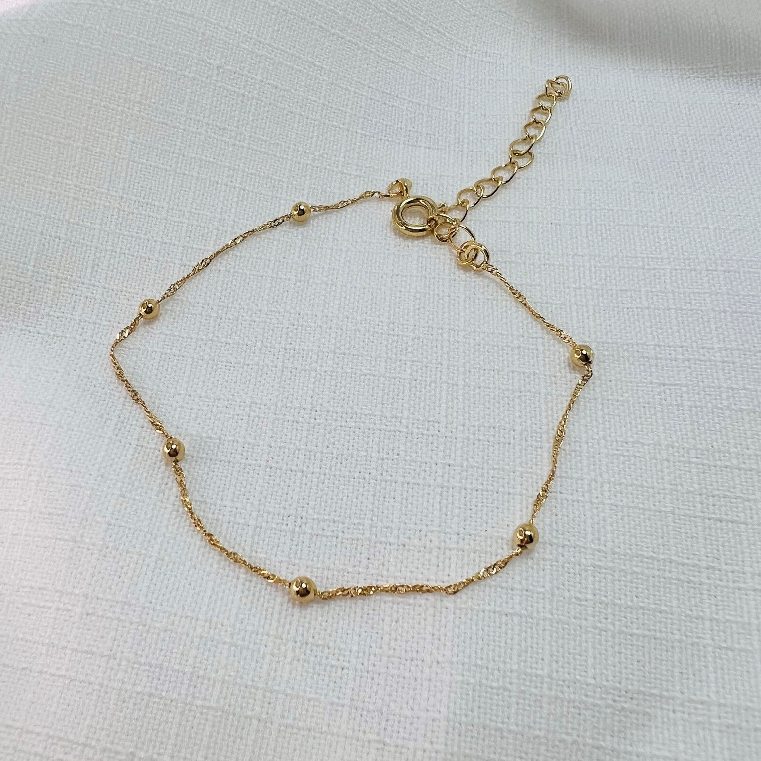 Pulseira Singapura de bolinhas