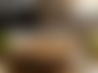 Baking scene with a bowl of apple crisp and apples on a wooden table. Text reads "Baking Verbs (Imperatives): Recipe: Baked Cinnamon Apple Crisp."