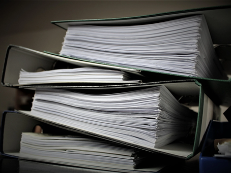 Binders Full of Paperwork