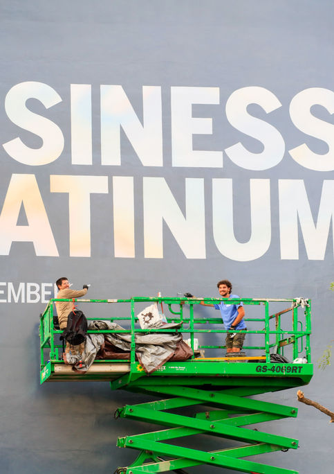 Hand painted Outdoor Advertising Mural for American Express Business Platinum Card in Williamsburg, Brooklyn