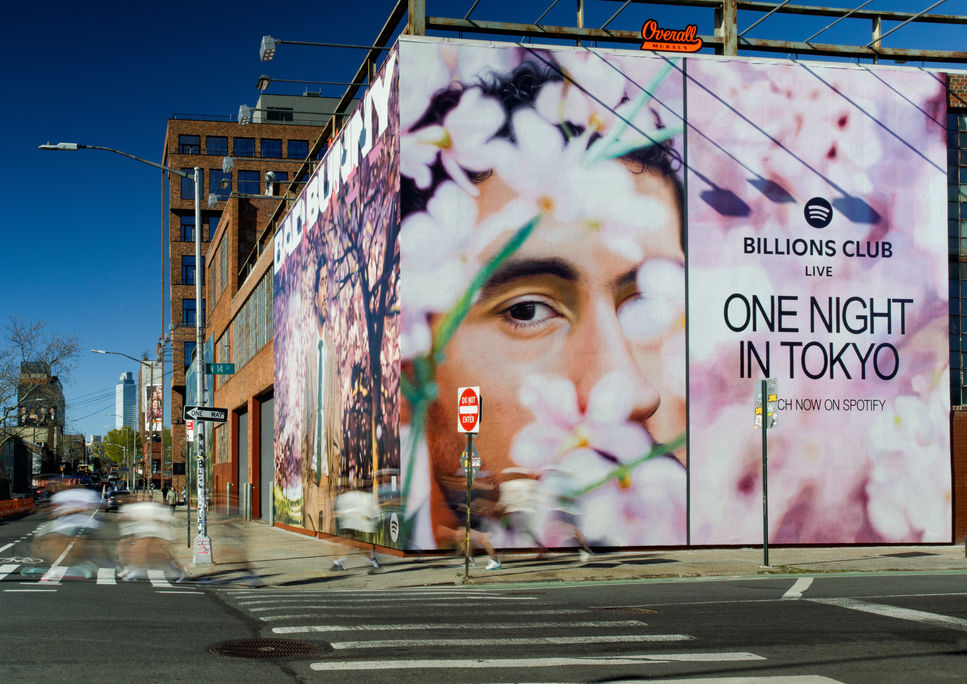 Hand painted advertisement for Spotify featuring Bad Bunny in Williamsburg, Brooklyn