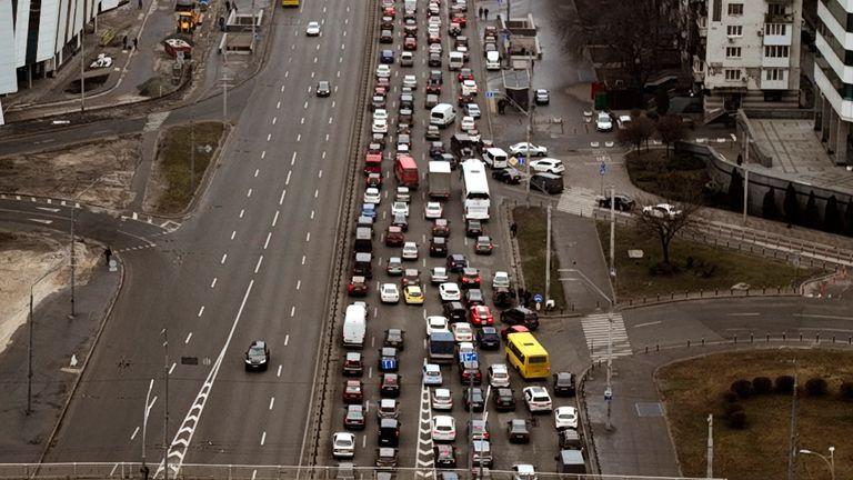 traffic jam Kyiv as cars escape Putin's war