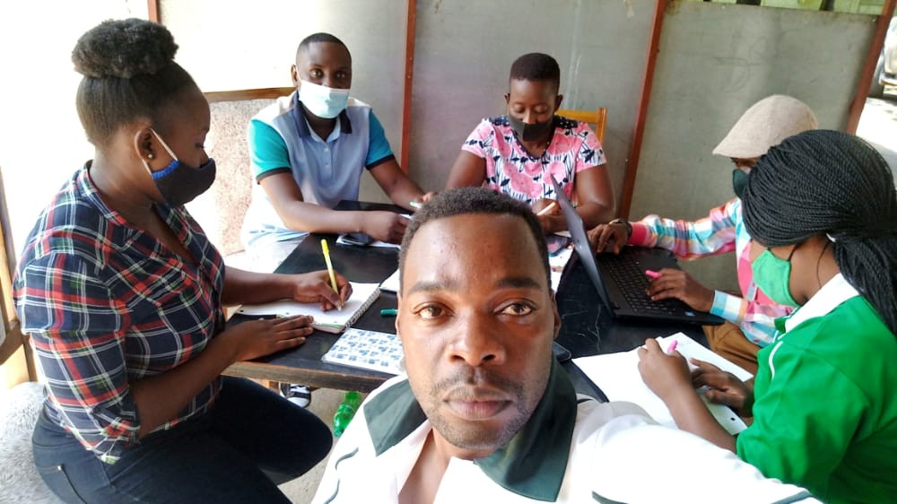 Letters to Strangers Zimbabwe Bipolar Day Workshop Picture of People Writing Letters