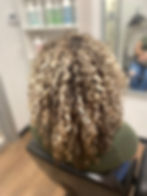 blonde highlights on curls