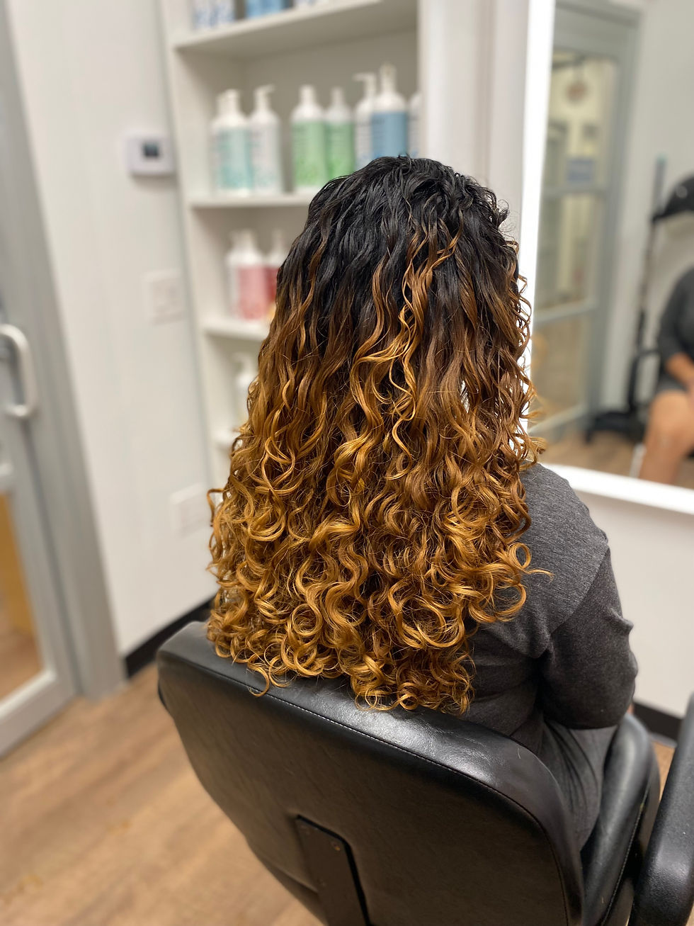 long layered haircut on curls