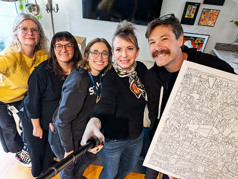 LtoR: Majken Koczara, Lea Greenwood, Allie (GTCD Board member) from The STILL and Carleen (GTCD Board) from Kickass Marketing celebrate the unboxing of the inaugural poster with artist Joe Palec.