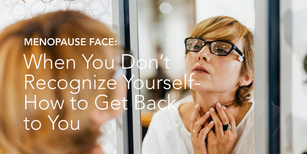 Menopausal woman looking in mirror 