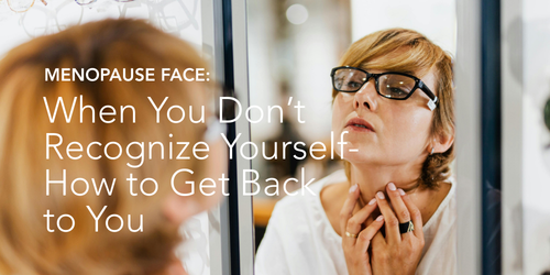 Menopausal woman looking in mirror