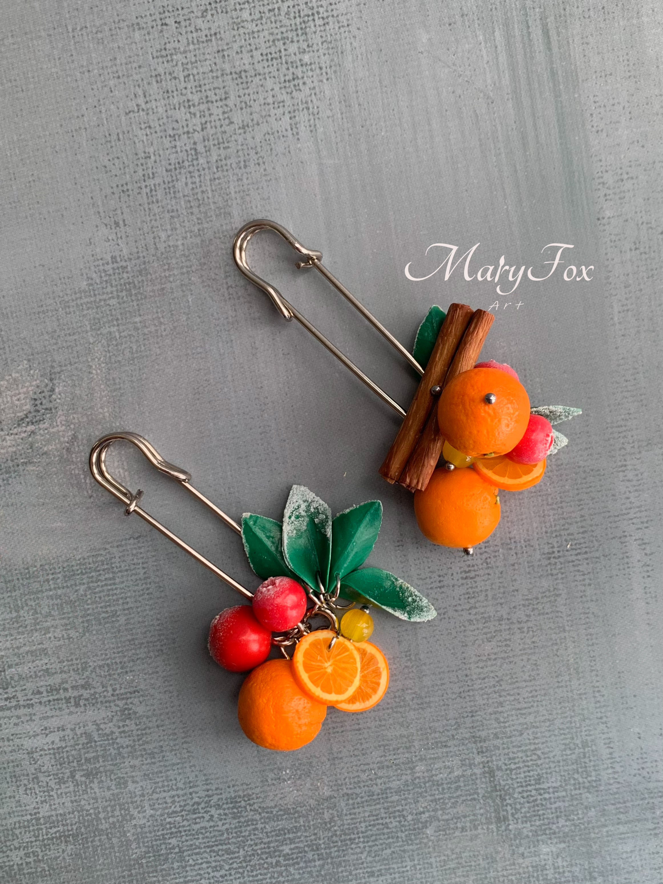Broche de cítricos