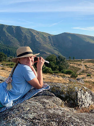 Mary photographing a mountain landscape in Portugal