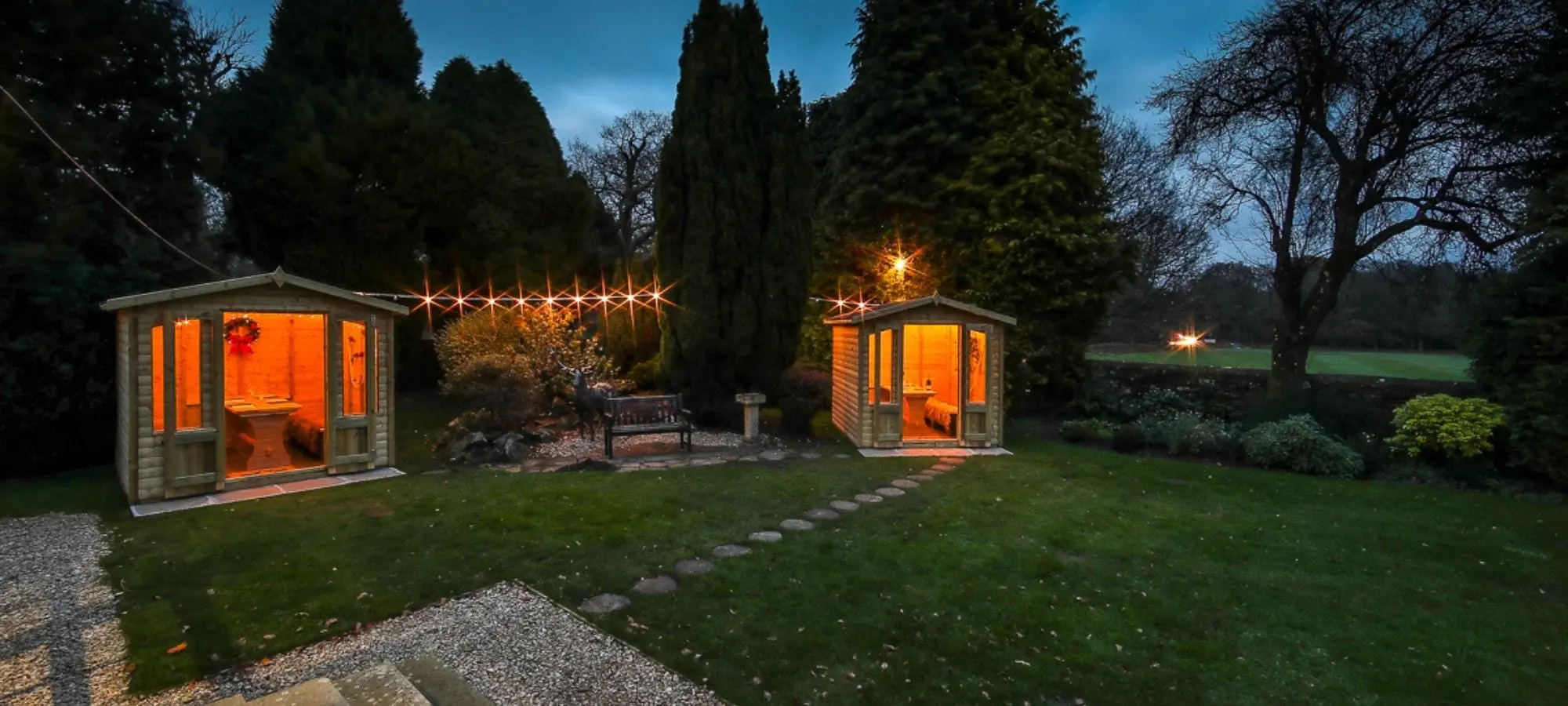 Outdoor-dining-Dens-at-twilight.webp